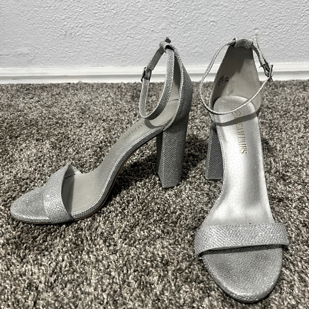 3.5 inch silver dream pairs heels. Size 8.